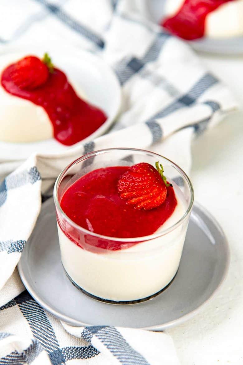 A close up of the classic panna cotta in a glass