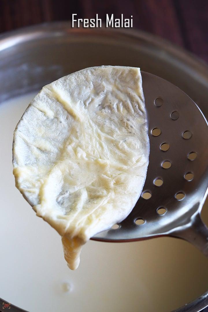 fresh cream formed after boiling milk